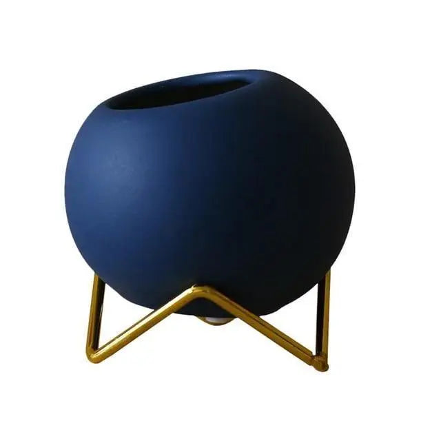 Keramische plantenpot met metalen standaard